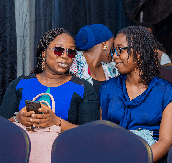 Two women smiling at Growth Africa Summit
