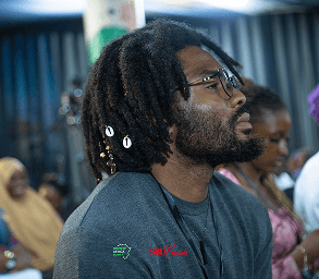 Attendee listening attentively